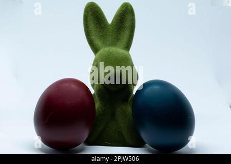 Easter bunny and red - blue easter eggs Stock Photo