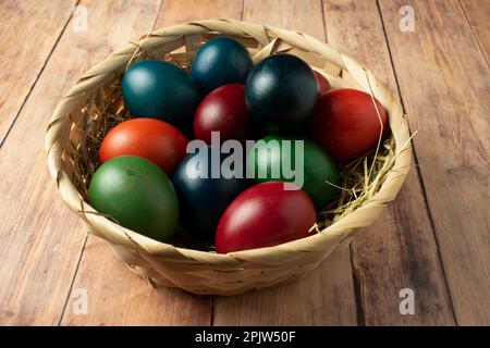 Easter eggs in a basket Stock Photo