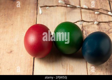 Red, green and blue easter eggs Stock Photo