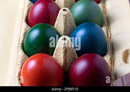 Easter eggs in paper basket Stock Photo