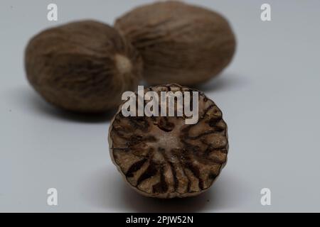 Nutmeg - white background Stock Photo
