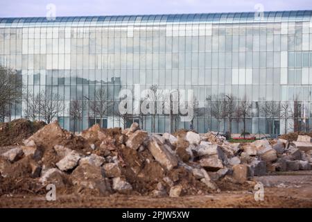 Leipzig, Germany. 04th Apr, 2023. Mountains of rubble lie on a neighboring property of the corporate headquarters of the gas supplier VNG AG. The number three on the German market had run into financial difficulties due to the energy crisis. The lack of Russian gas supplies had to be replaced expensively from other sources. Credit: Jan Woitas/dpa/Alamy Live News Stock Photo