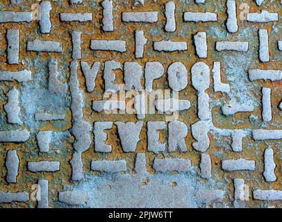 Embossed rusting cast iron grid - Liverpool Sewers, waterworks and sanitation for citizens Stock Photo