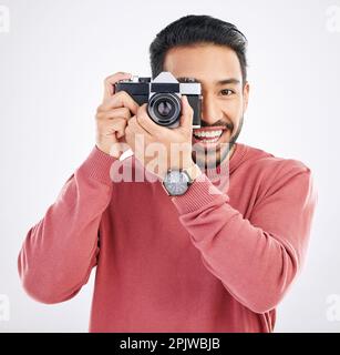 Happy, photographer and portrait of Asian man with a camera isolated on a white background in studio. Smile, work and a Japanese journalist in Stock Photo