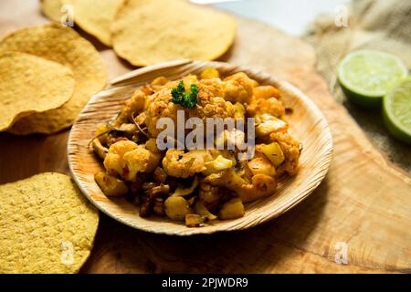 Cauliflower cooked in the oven au gratin and with other vegetables such as pumpkin. Stock Photo