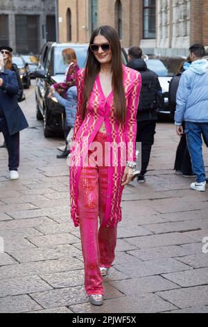 MILAN, ITALY - FEBRUARY 25, 2023: Woman with Pink Jacket with Black Roses  and Black Leggings before Missoni Fashion Show, Milan Editorial Photo -  Image of accessory, pink: 275042826