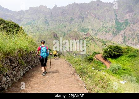 Mother and son, tourists, on a beautiful hiking trail in the mountains of Santo Antao island, Cabo verde Stock Photo
