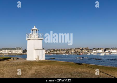 Lighthouse and natural harbour, Barfleur, Manche, Normandy, France Stock Photo