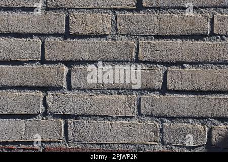 Closeup of pattern of yellow brick wall Stock Photo