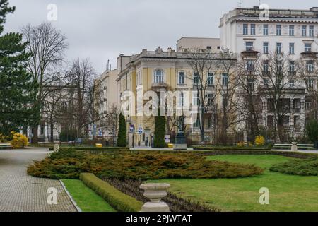 old buildings and trees in Ujazdowski Park, Warsaw, Poland Stock Photo