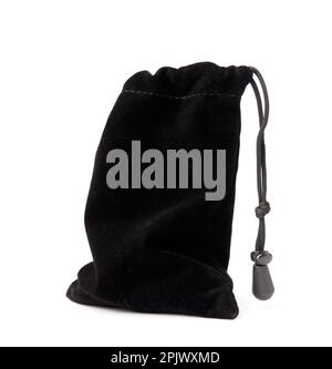 Black soft fabric pouch with drawstring isolated on white background. Velvet black bag. Stock Photo