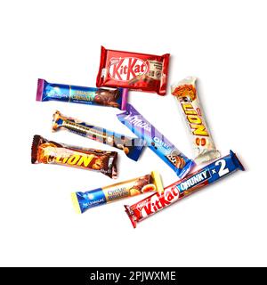 Mykolaiv, Ukraine, - November 27, 2022 Chocolate bars in original packages isolated on white background, top view. Chocolate in a wrapper. Stock Photo