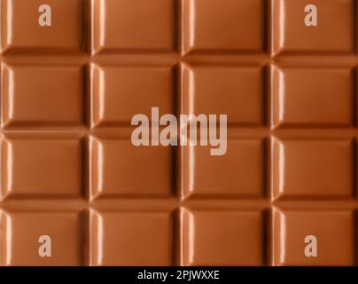 Chocolate background. Milk chocolate with a beautiful texture close-up as a background. Stock Photo