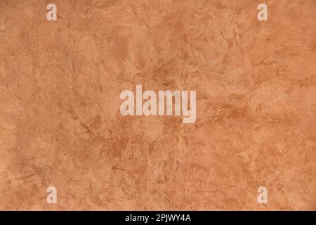 Brown abstract background with place for text, texture pearl brown background for design, text, advertising, decorative plaster texture for walls. Stock Photo