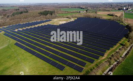 Aerial view of the largest Walloon solar panel installation, in Braine l'Alleud, Tuesday 04 April 2023. The municipality of Braine-l'Alleud inaugurated a field of photovoltaic panels of 19 hectares, designed by the municipal authorities and located in an old sand pit. Nearly 18,500 south-facing two-sided photovoltaic panels will provide up to 40 million kWh each year - i.e. the annual consumption of 4,000 households - and the electricity will arrive directly on the site of the UCB company, located at a few hundred meters. BELGA PHOTO ERIC LALMAND Credit: Belga News Agency/Alamy Live News Stock Photo