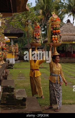People praying and making offerings at the Pura Penataran Sasih Temple (Holy Moon Temple) in Pejeng Ubud, Bali. Stock Photo