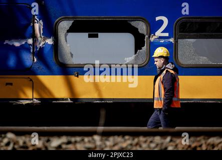 Voorschoten - Investigation of a derailed night train. The passenger train collided with construction equipment on the track. One person died and several people were seriously injured. A freight train was also involved in the accident. ANP ROBIN VAN LONKHUIJSEN netherlands out - belgium out Stock Photo