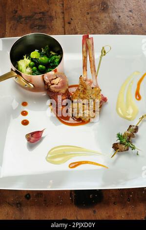 Breaded rabbit legs and saddle by Chef Ciccio Sultano of the Duomo restaurant, with two Michelin stars, is one of the most representative of the new I Stock Photo