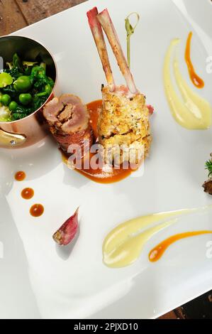 Breaded rabbit legs and saddle by Chef Ciccio Sultano of the Duomo restaurant, with two Michelin stars, is one of the most representative of the new I Stock Photo