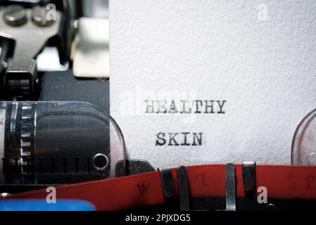 Healthy skin text written with a typewriter. Stock Photo