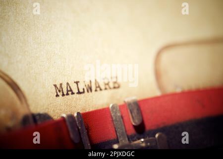Malware word written with a typewriter. Stock Photo