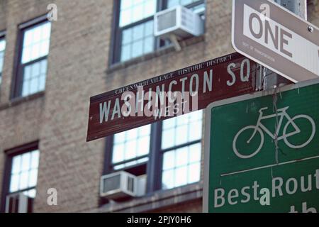 Washington Square West brown traffic sign in New York Stock Photo