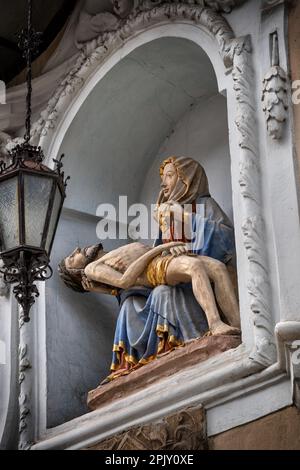 Statue of Jesus Christ and Blessed Virgin Mary, Gothic Pieta sculpture in niche of the Ljubljana Cathedral - Saint Nicholas's Church in Ljubljana, Slo Stock Photo
