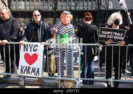 New York, USA. 04th Apr, 2023. Demonstrators protest in Collect Pond Park across the street from the Manhattan District Attorney's Office during the arraignment of Donald Trump against the former U.S. president. Trump is the first ex-president in U.S. history to face criminal charges. The Manhattan district attorney's office has announced an indictment against the Republican, who is again seeking a presidential run in the November 2024 election. Credit: Christina Horsten/dpa/Alamy Live News Stock Photo