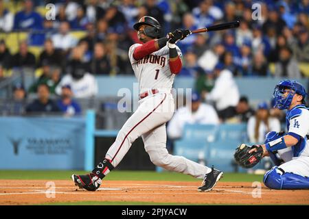 Arizona Diamondbacks' Kyle Lewis swings at a pitch during the first inning  of a baseball game against the Los Angeles Dodgers Friday, April 7, 2023,  in Phoenix. (AP Photo/Ross D. Franklin Stock