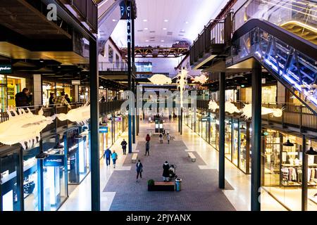 Industrial interior of the Battersea Power Station shopping centre, London, UK Stock Photo