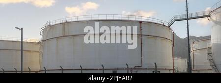 White petrochemical storage tanks or tank farm Stock Photo