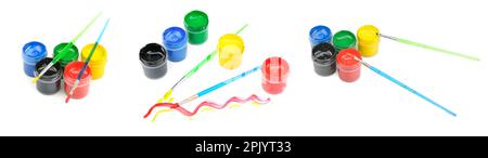 Watercolor paints and brushes isolated on white background. Stock Photo