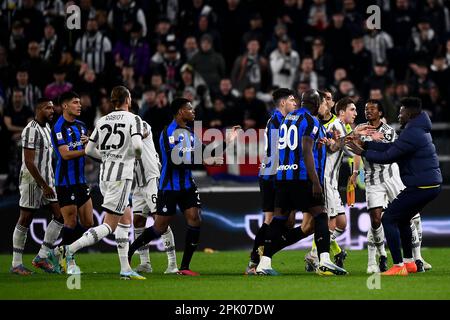 Turin, Italy. 04 April 2023. Filip Kostic of Juventus FC kicks the ball  during the Coppa Italia semi final first leg football match between Juventus  FC and FC Internazionale. Credit: Nicolò Campo/Alamy