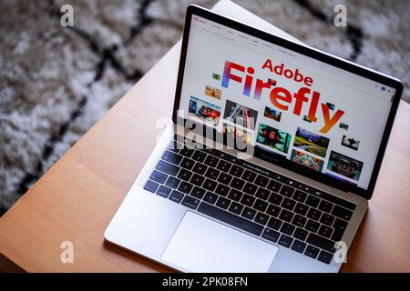 ITALY - April 4, 2023: Adobe Firefly website displayed on mac laptop screen. Adobe has announced the beta release of its AI Art Generator tool. Stock Photo