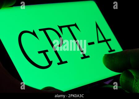 ChatGPT GPT-4 logo seen on the screen of smartphone. Concept for AI tool. Stafford, UK, April 4, 2023 Stock Photo