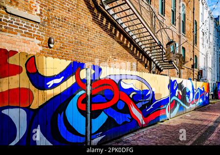 Fishbone Alley is pictured, April 2, 2023, in Gulfport, Mississippi. The brick alley is filled with graffiti. Stock Photo