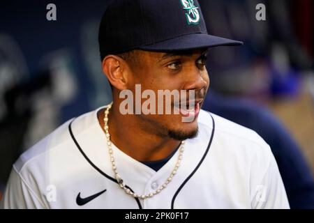 Seattle Mariners' Julio Rodriguez puts on batting gear in the dugout during  a baseball game against the Washington Nationals, Wednesday, June 28, 2023,  in Seattle. (AP Photo/Lindsey Wasson Stock Photo - Alamy