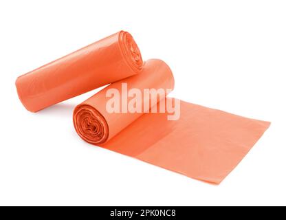 Roll of red garbage bags isolated on white Stock Photo by