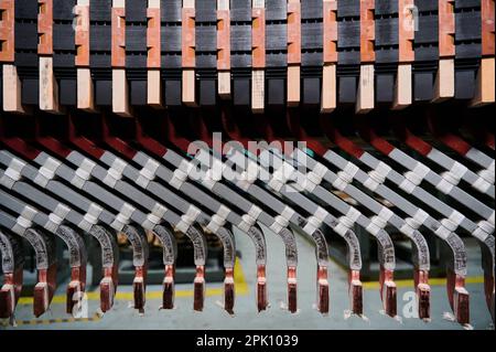 Group of colorful metal details of electric motor at plant Stock Photo ...