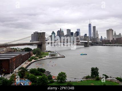 A view of the East River, The Brooklyn bridge and Manhattan seen from the Manhattan bridge in New York CIty, USA. Stock Photo