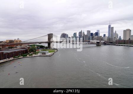 A view of the East River, The Brooklyn bridge and Manhattan seen from the Manhattan bridge in New York CIty, USA. Stock Photo