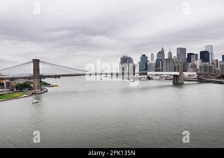 A view of the East River, The Brooklyn bridge and Manhattan seen from the Manhattan bridge in New York CIty, USA. Stock Photo