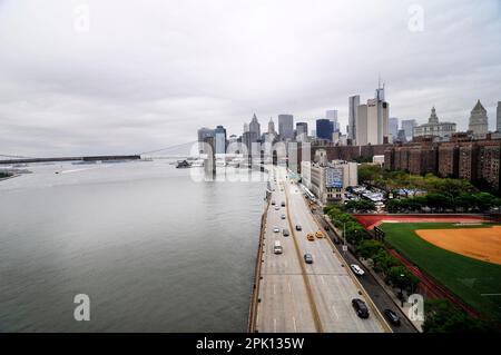 A view of Manhattan and the FDR Drive as seen from the Manhattan Bridge in New York City, USA. Stock Photo