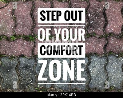 Motivational and inspirational quote written with phrase STEP OUT OF YOUR COMFORT ZONE Stock Photo