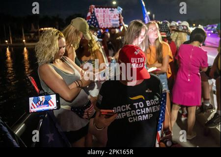 West Palm Beach, Florida, USA. 4th Apr, 2023. Supporters of President Donald J. Trump gather outside of Mar-a-Lago to listen to President Trump's speech after he was charged with 34 felonies (Credit Image: © Orit Ben-Ezzer/ZUMA Press Wire) EDITORIAL USAGE ONLY! Not for Commercial USAGE! Stock Photo