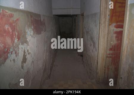 An old abandoned dungeon or basement in ruins. Shelter underground Stock Photo