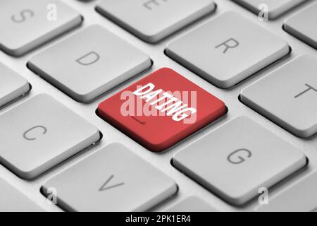 Red button with word Dating on computer keyboard, closeup Stock Photo