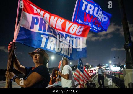 West Palm Beach, Florida, USA. 4th Apr, 2023. Supporters of President Donald J. Trump gather outside of Mar-a-Lago to listen to President Trump's speech after he was charged with 34 felonies. (Credit Image: © Orit Ben-Ezzer/ZUMA Press Wire) EDITORIAL USAGE ONLY! Not for Commercial USAGE! Stock Photo