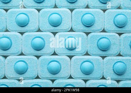 Many water softener tablets as background, top view Stock Photo