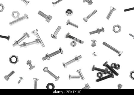 Many different bolts and nuts falling on white background Stock Photo